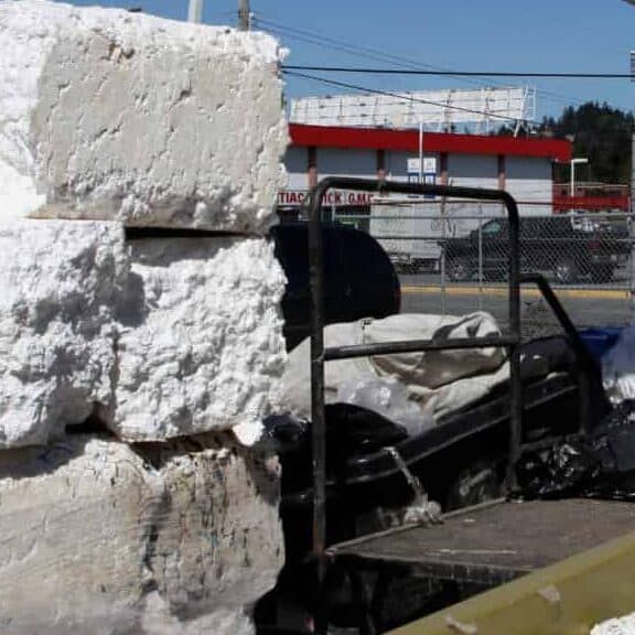 Shredded and packed styrofoam at a recycling center