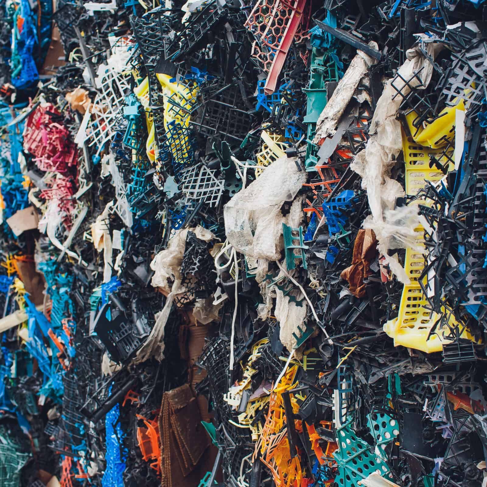 Plastic pressed bales at the modern waste hazardous processing plant. Separate garbage collection. Recycling and storage of waste for further disposal. Business for sorting and processing of waste