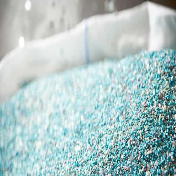 Plastic raw materials - small blue parts for the production of various products